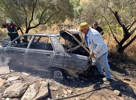 Aracı alev alev yanıyordu! Direksiyona geçti, büyük felaketi son anda önledi